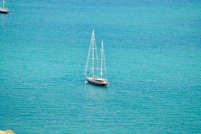 High angle view of sailboat sailing on sea