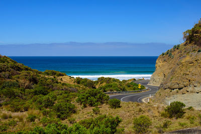 Scenic view of sea against clear blue sky