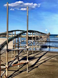 Pier over sea against sky