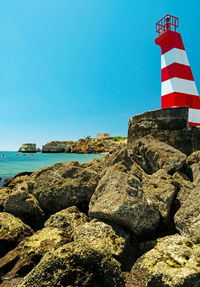 Scenic view of sea against clear blue sky