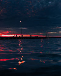 Scenic view of sea against dramatic sky