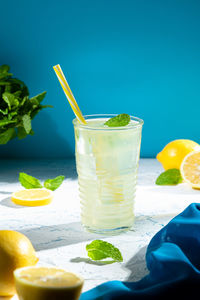 Glass of fresh homemade tasty lemonade with copyspace. vertical format.