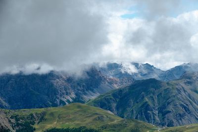 Scenic view of mountains in foggy weather