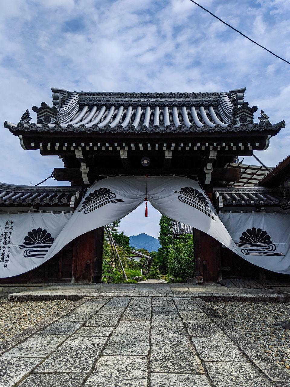 architecture, built structure, building exterior, sky, cloud, building, nature, travel destinations, history, the past, roof, no people, religion, tradition, travel, city, belief, day, outdoors, chinese architecture, place of worship, temple - building, landmark, tourism, gate, spirituality, temple, plant