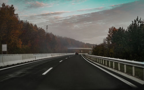 Empty road against sky