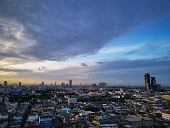 High angle view of city buildings during sunset
