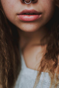 Close-up of woman with nose ring