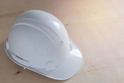 High angle view of hardhat on table 