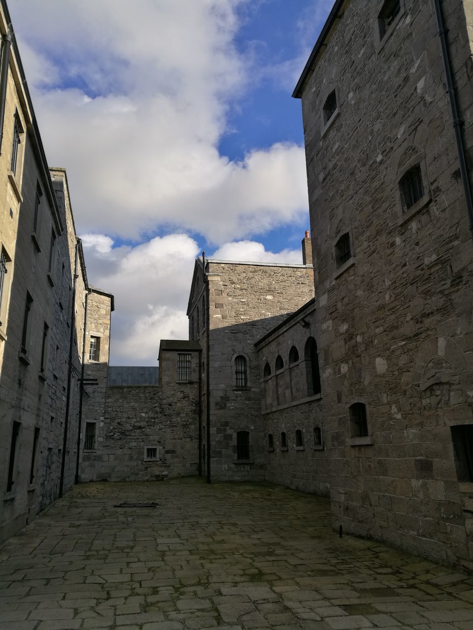 architecture, sky, building exterior, built structure, travel destinations, cloud - sky, outdoors, history, no people, medieval, day, astronomical clock