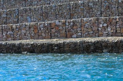 Full frame shot of wall by swimming pool