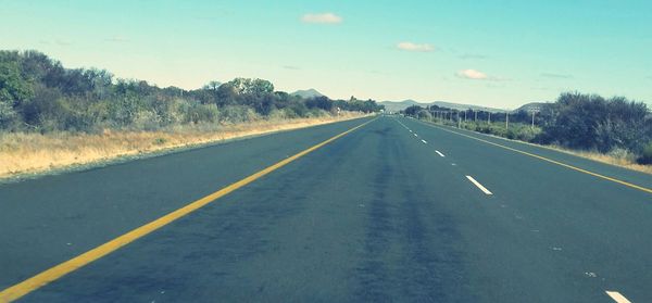 Road passing through trees