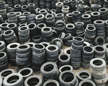 Close-up of stack of pipes in factory