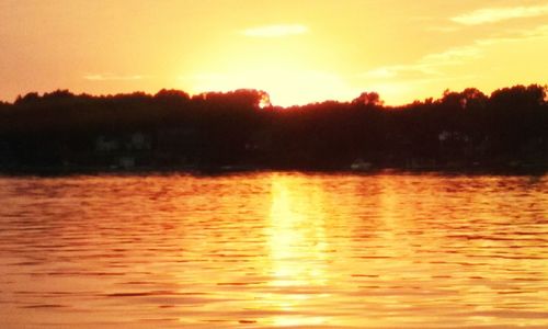 Scenic view of sunset over sea