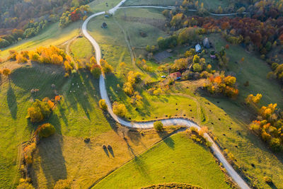 High angle view of road amidst landscape during autumn