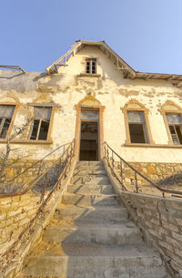 Low angle view of old building against sky