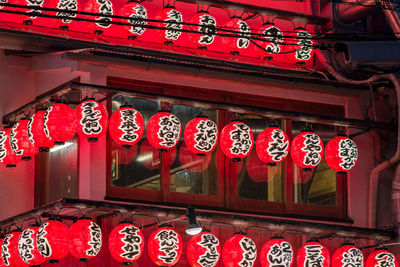 Red lanterns hanging in row