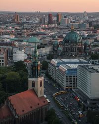 High angle view of buildings in city against sky