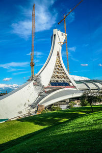 Low angle view of built structure against blue sky