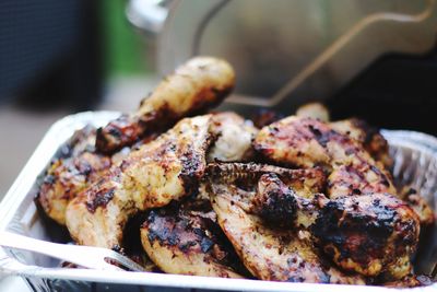 Close-up of meat on barbecue grill