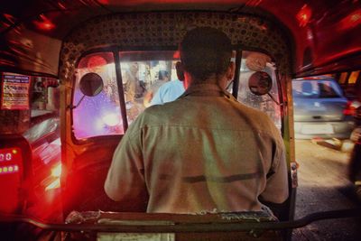 Rear view of man in subway