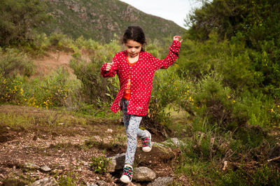 Girl running on field