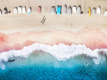 High angle view of boats moored at beach