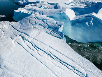 Aerial view of snow covered landscape