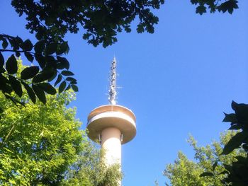 Low angle view of tower against clear blue sky