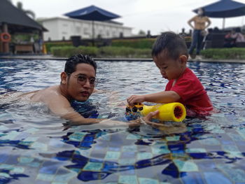 Portrait of boy in swimming pool