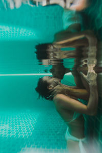 Woman swimming in pool