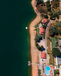 High angle view of swimming pool by building