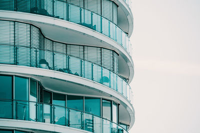 Low angle view of modern building against clear sky