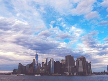 View of buildings against cloudy sky