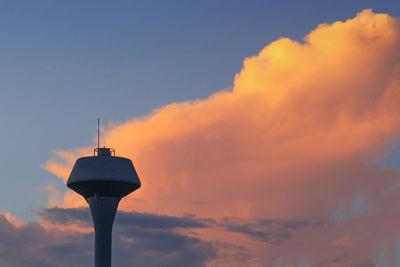 Low angle view of street light against sky during sunset