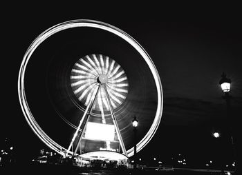 The big wheel light trial at place de la concorde against sky