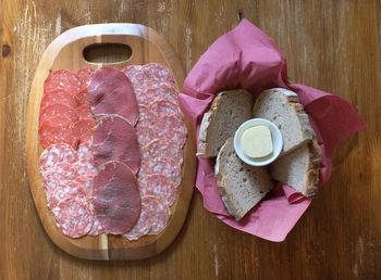 Variety of cold cuts with bread