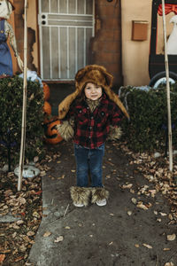 Portrait of girl standing outdoors