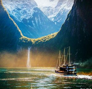 Scenic view of sea with mountains in background