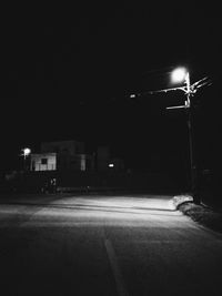 Illuminated street lights at night