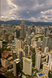 High angle view of modern buildings in city