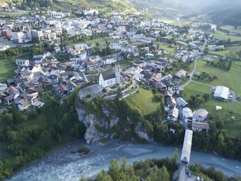 High angle view of river amidst buildings in city