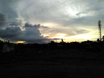 Scenic view of landscape against cloudy sky