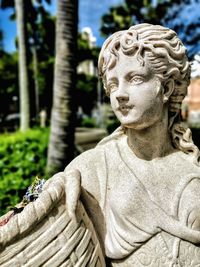 Close-up of angel statue outdoors