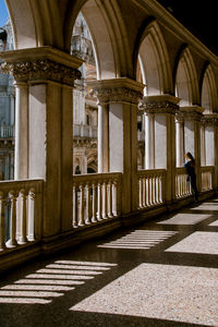 Rear view of man standing in building