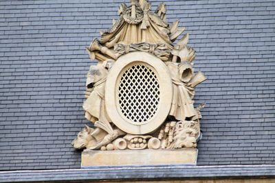 Low angle view of statue of historic building