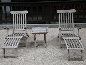 Empty chairs and table in cafe