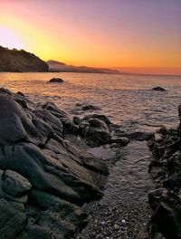 Scenic view of sea against sky during sunset