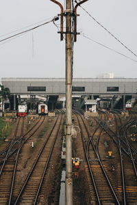 Train on railroad tracks against sky