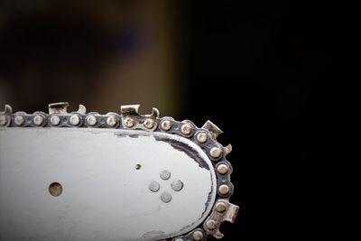 Close-up of metal against black background