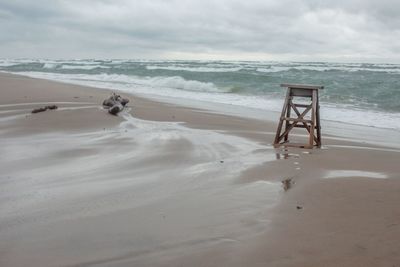 Scenic view of beach and sea against sky